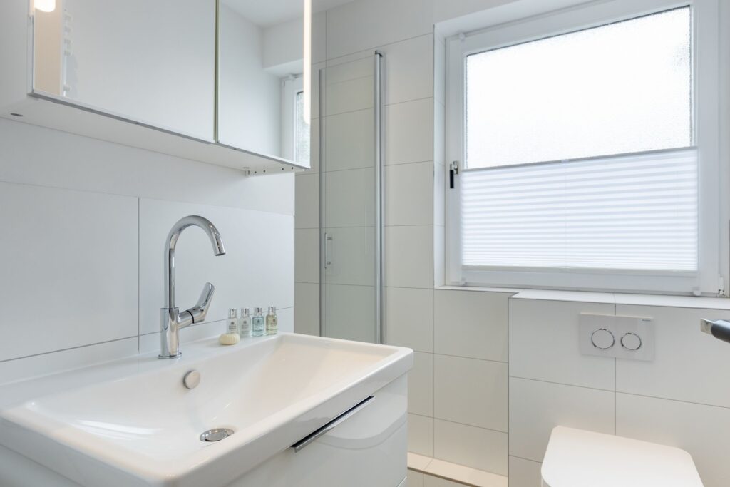 Badezimmer in Ferienwohnung Wenningstedt