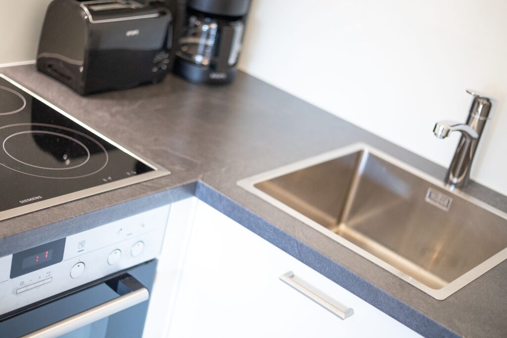 Küche in Ferienwohnung Wenningstedt
