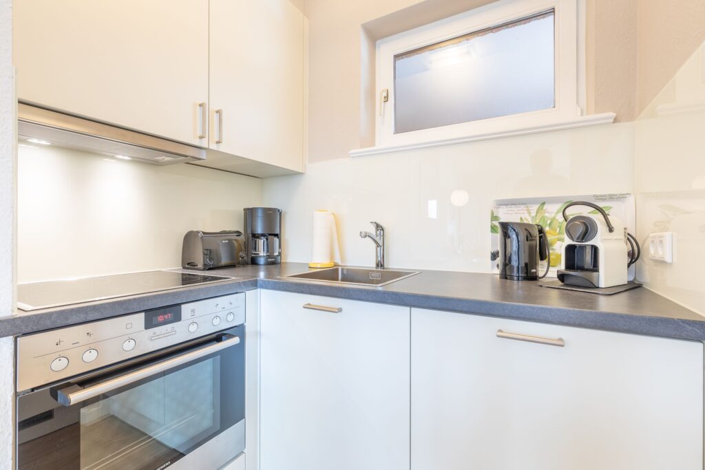 Küche in Ferienwohnung Wenningstedt