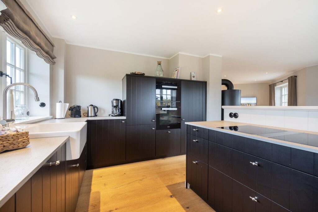 Küche in Ferienwohnung Wenningstedt