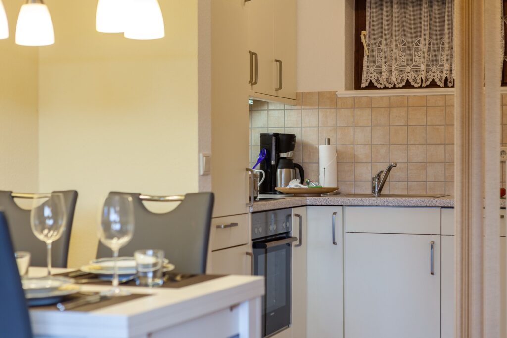Küche in Ferienwohnung Wenningstedt