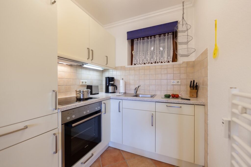 Küche in Ferienwohnung Wenningstedt