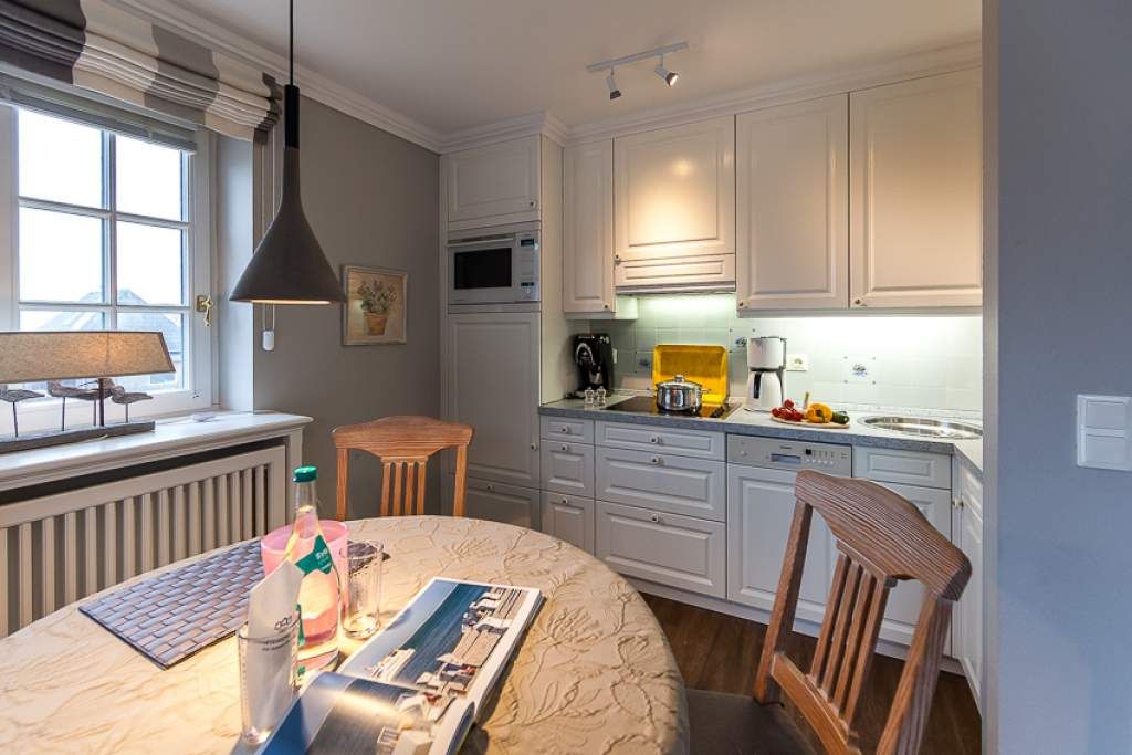 Küche in Ferienwohnung Wenningstedt