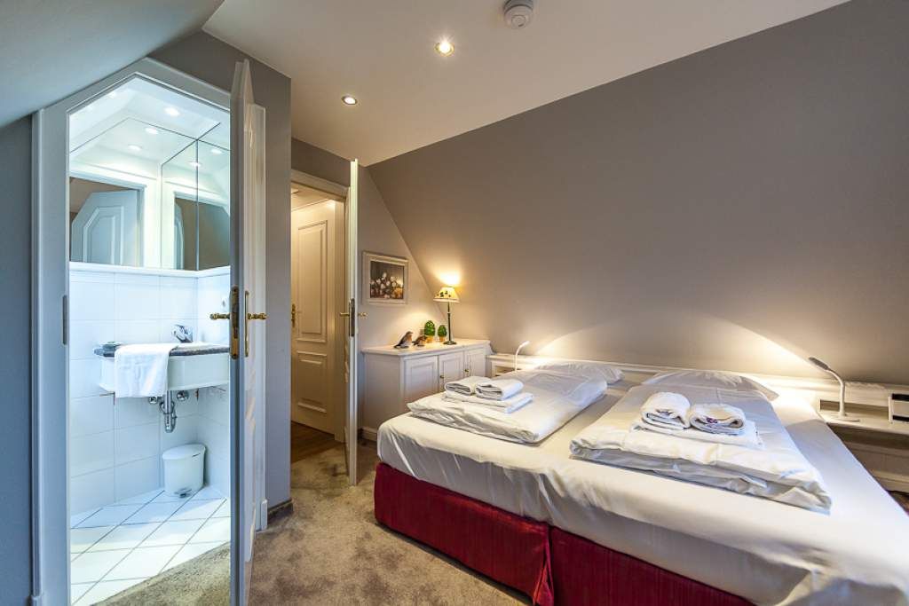 Schlafzimmer in Ferienwohnung Wenningstedt
