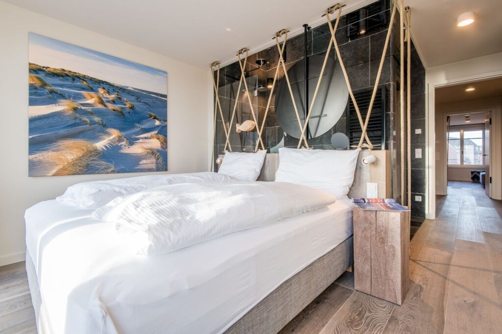 Bett in Ferienwohnung Wenningstedt
