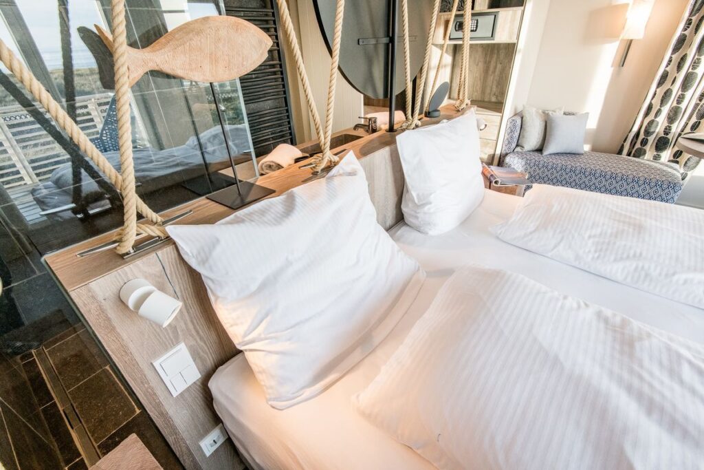 Schlafzimmer in Ferienwohnung Wenningstedt
