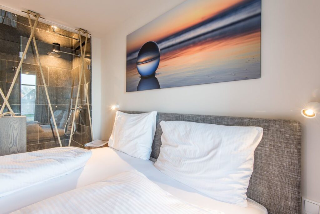 Schlafzimmer in Ferienwohnung Wenningstedt