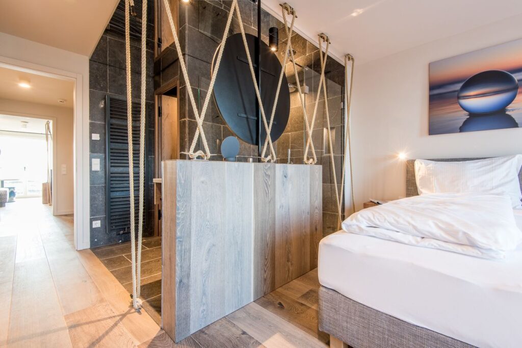 Schlafzimmer in Ferienwohnung Wenningstedt