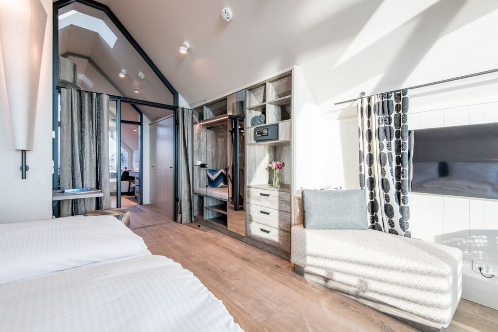Schlafzimmer in Ferienwohnung Wenningstedt