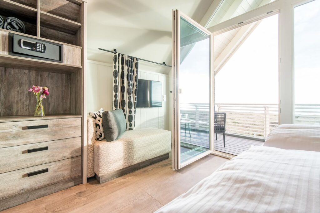 Schlafzimmer in Ferienwohnung Wenningstedt