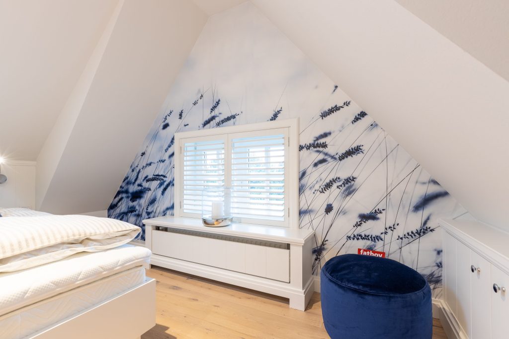 Schlafzimmer in Ferienwohnung Wenningstedt