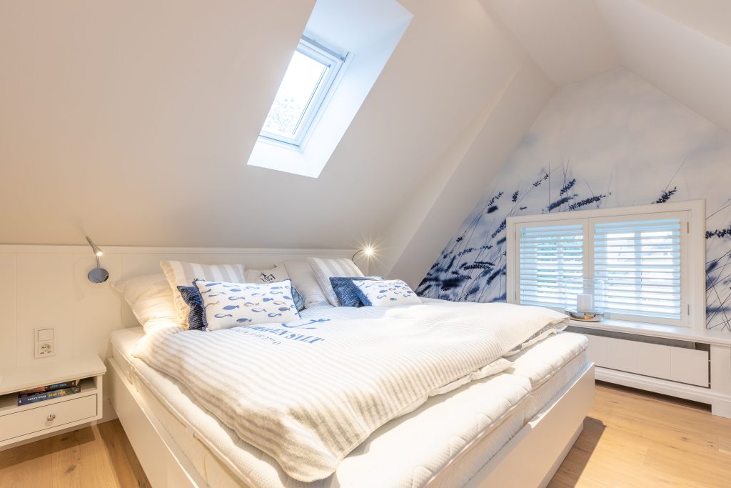 Schlafzimmer in Ferienwohnung Wenningstedt