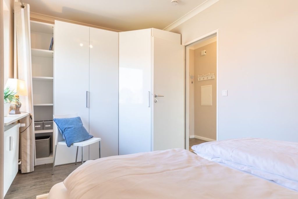 Schlafzimmer in Ferienwohnung Wenningstedt