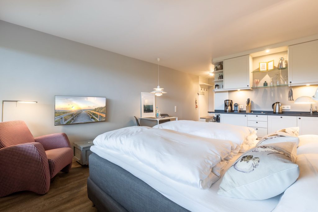 Schlafzimmer in Ferienwohnung Wenningstedt