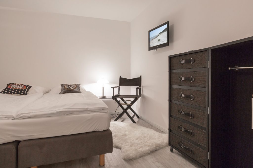 Schlafzimmer in Ferienwohnung Wenningstedt
