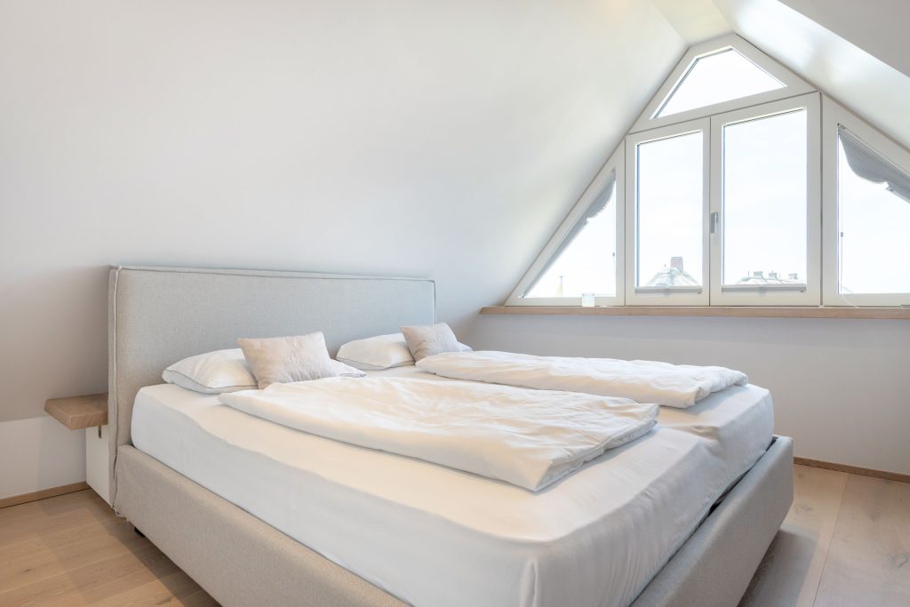 Schlafzimmer in Ferienwohnung Wenningstedt