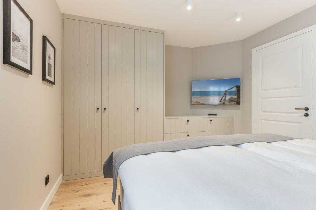 Schlafzimmer in Ferienwohnung Wenningstedt