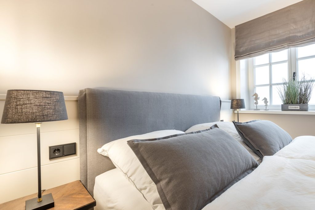 Schlafzimmer in Ferienwohnung Wenningstedt