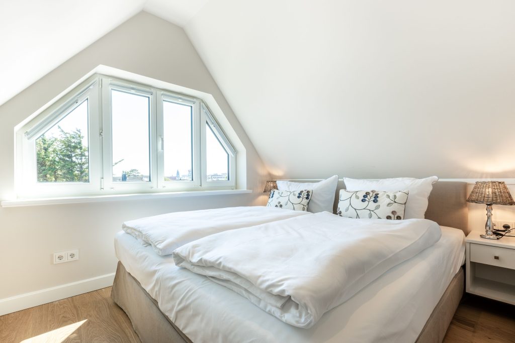Schlafzimmer in Ferienwohnung Wenningstedt