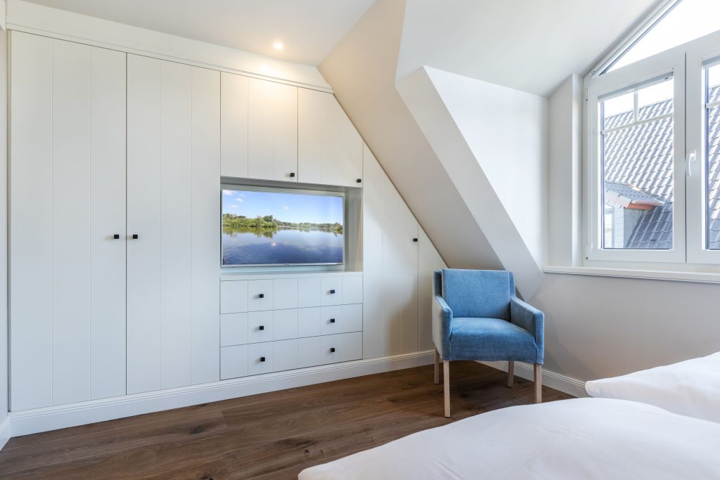 Schlafzimmer in Ferienwohnung Wenningstedt