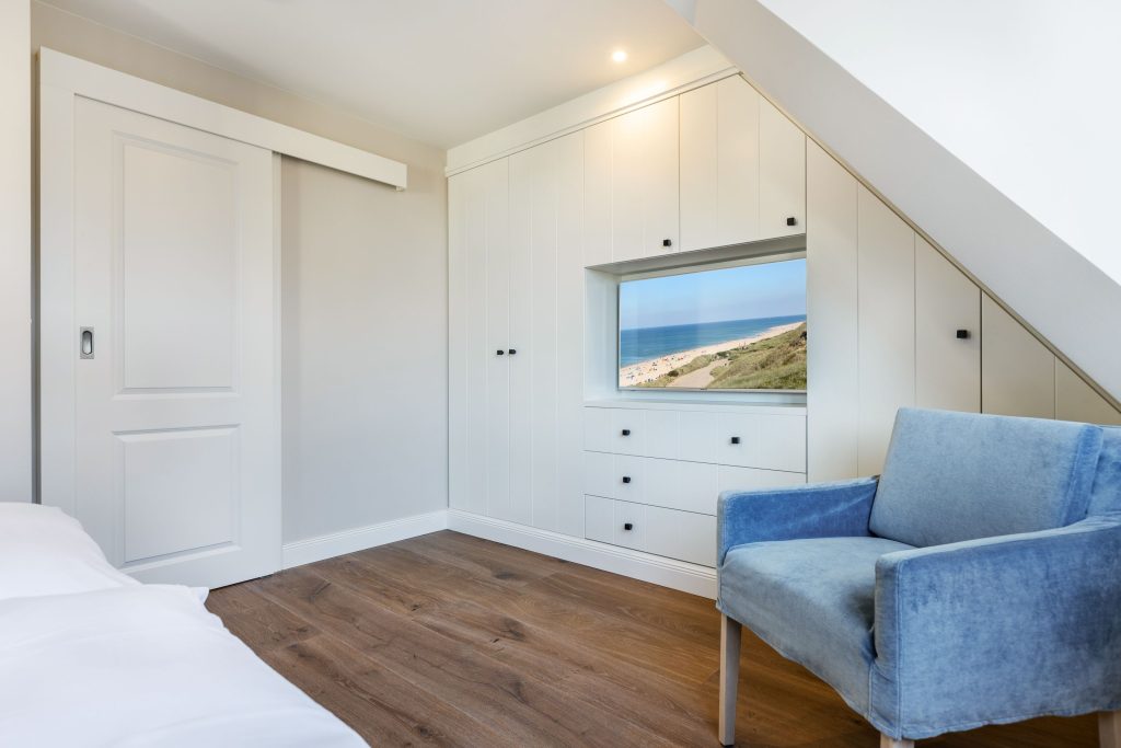 Schlafzimmer in Ferienwohnung Wenningstedt