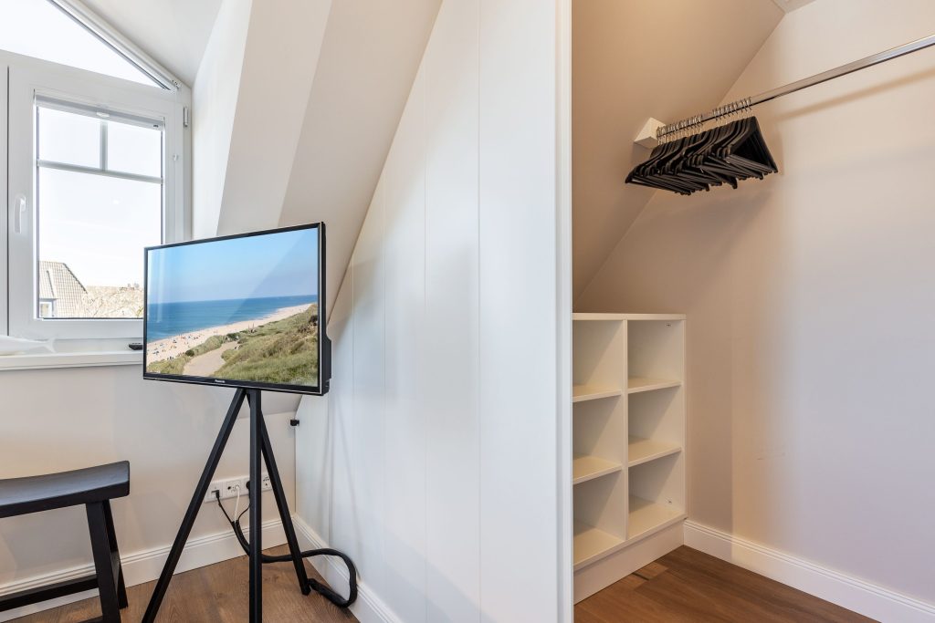 Schlafzimmer in Ferienwohnung Wenningstedt