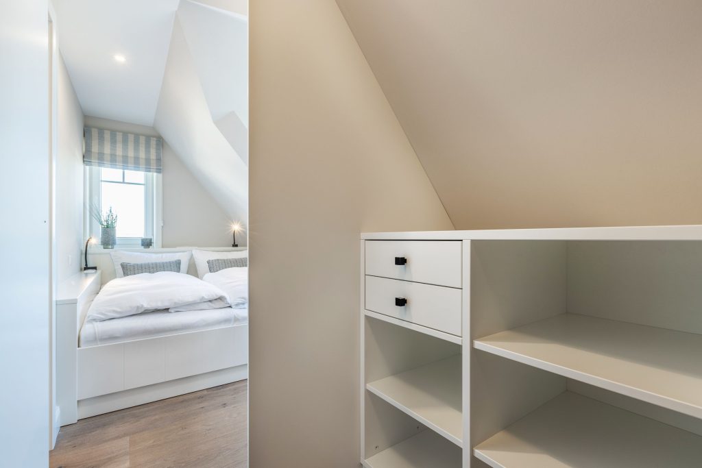 Schlafzimmer in Ferienwohnung Wenningstedt