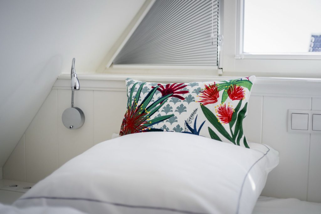 Schlafzimmer in Ferienwohnung Wenningstedt
