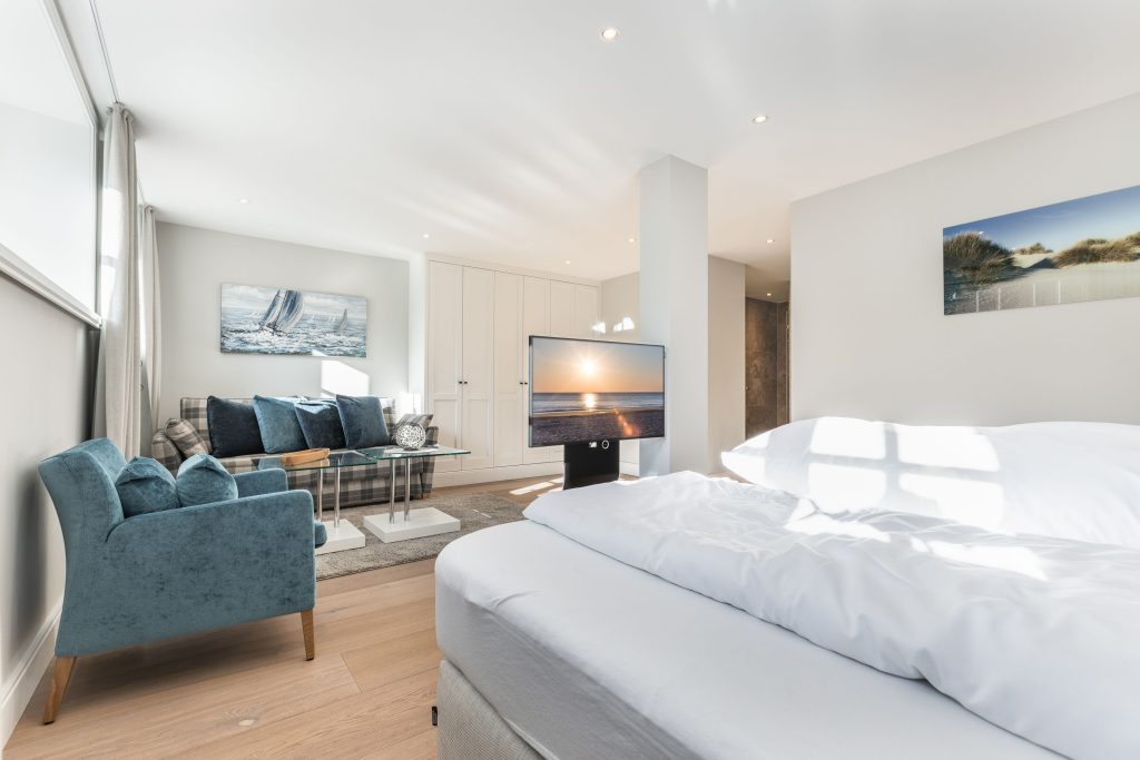 Schlafzimmer in Ferienwohnung Wenningstedt