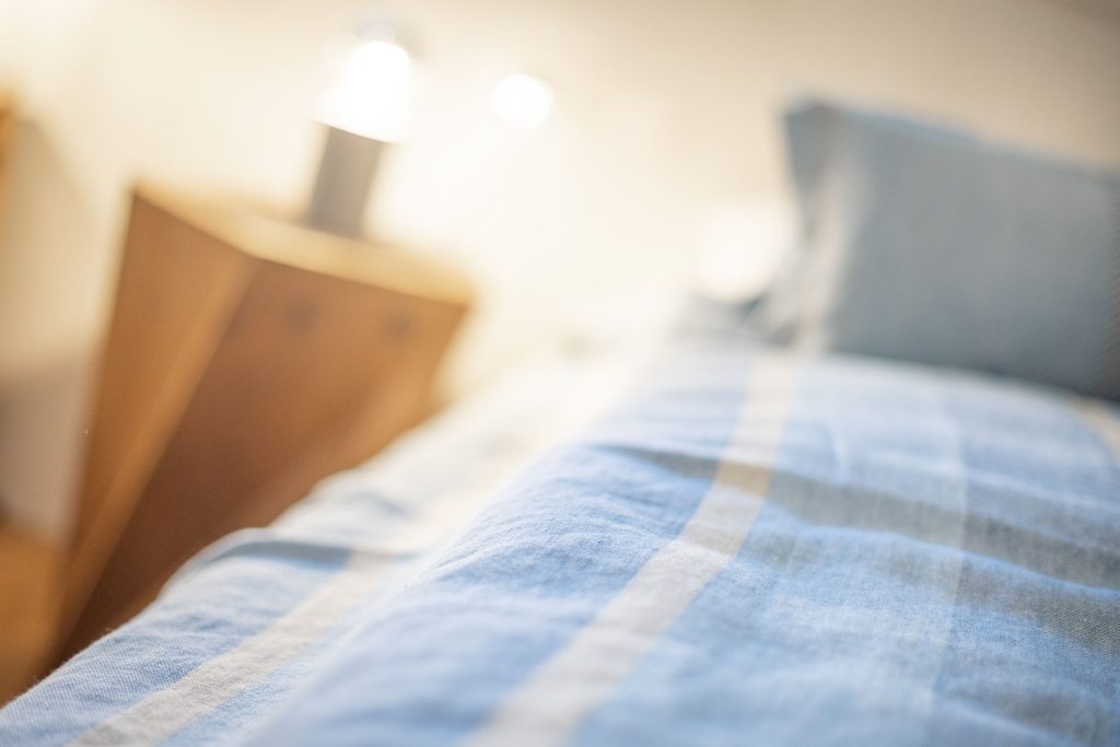Schlafzimmer in Ferienwohnung Wenningstedt