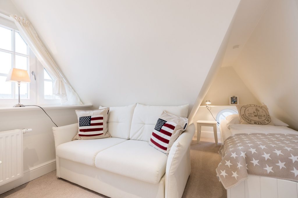 Schlafzimmer in Ferienwohnung Wenningstedt