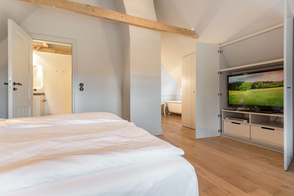 Schlafzimmer in Ferienwohnung Wenningstedt