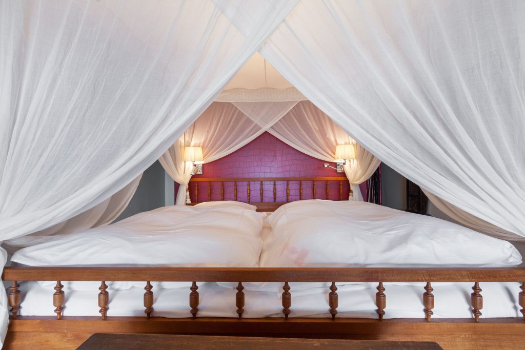 Schlafzimmer in Ferienwohnung Wenningstedt