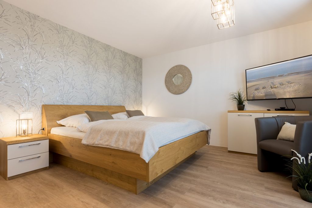 Schlafzimmer in Ferienwohnung Wenningstedt