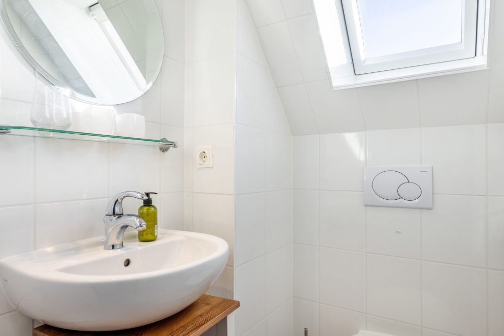 Badezimmer in Ferienwohnung in Wenningstedt