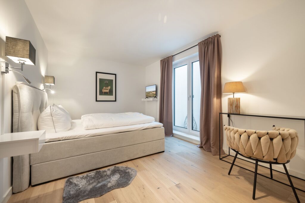 Schlafzimmer in Ferienwohnung Wenningstedt