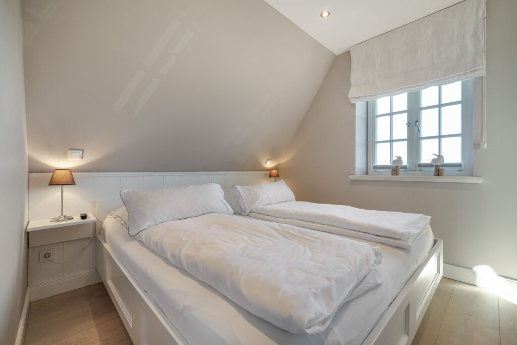 Schlafzimmer in einem Ferienhaus auf Sylt