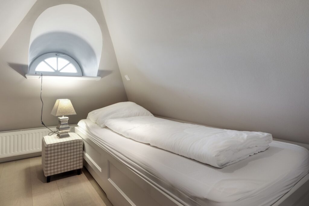 Schlafzimmer in einem Ferienhaus auf Sylt