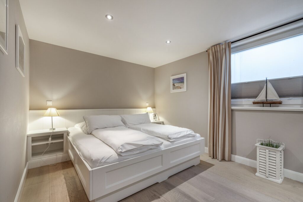 Schlafzimmer in einem Ferienhaus auf Sylt