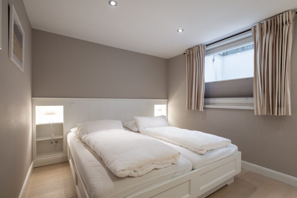 Schlafzimmer in einem Ferienhaus auf Sylt